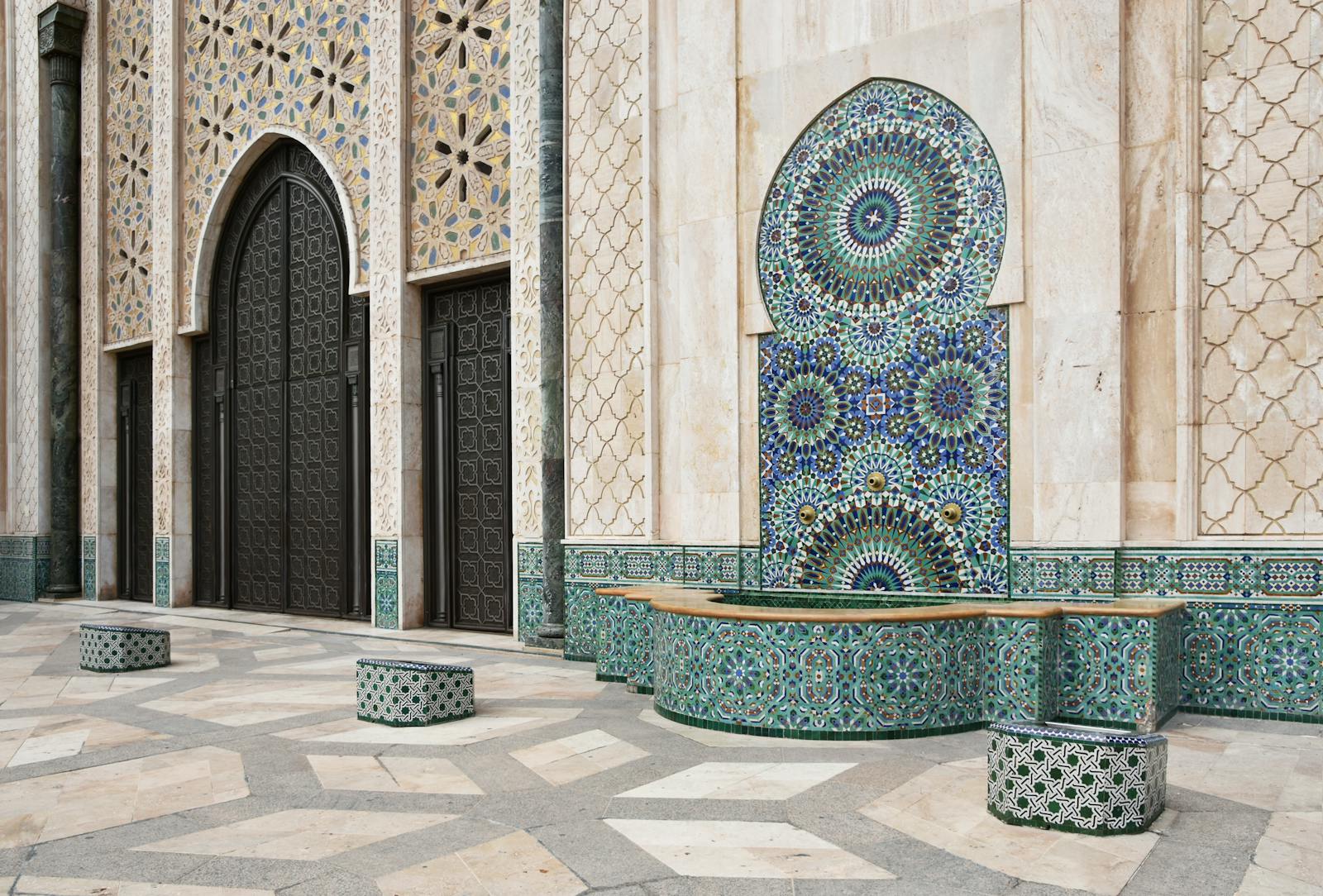 Explore the ornate mosaics and Moorish architecture of a mosque in Casablanca, Morocco.10 day Morocco tour from Casablanca