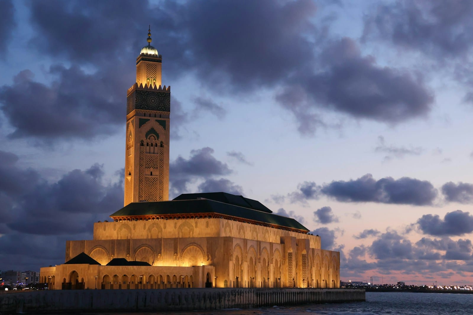 a tall tower with a clock on top of it,11 days tour from Casablanca