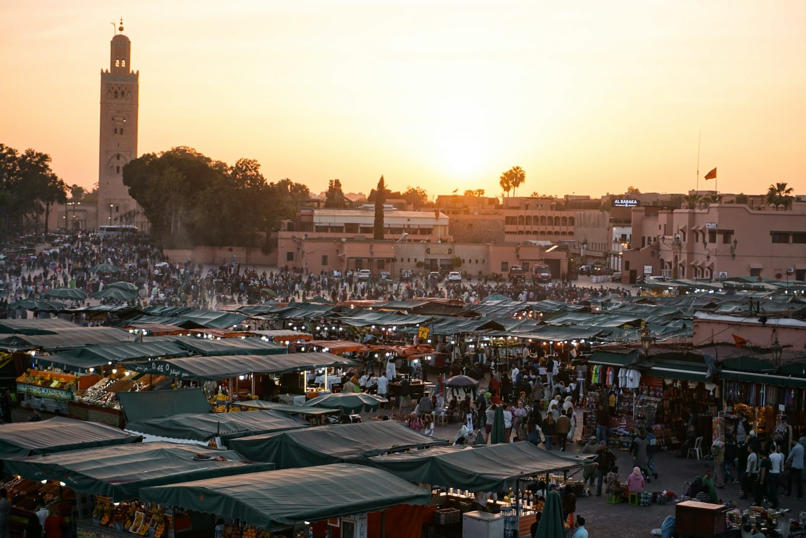 wide-angle photography of people gathering near outdoor during daytime,activities to do in Marrakech
