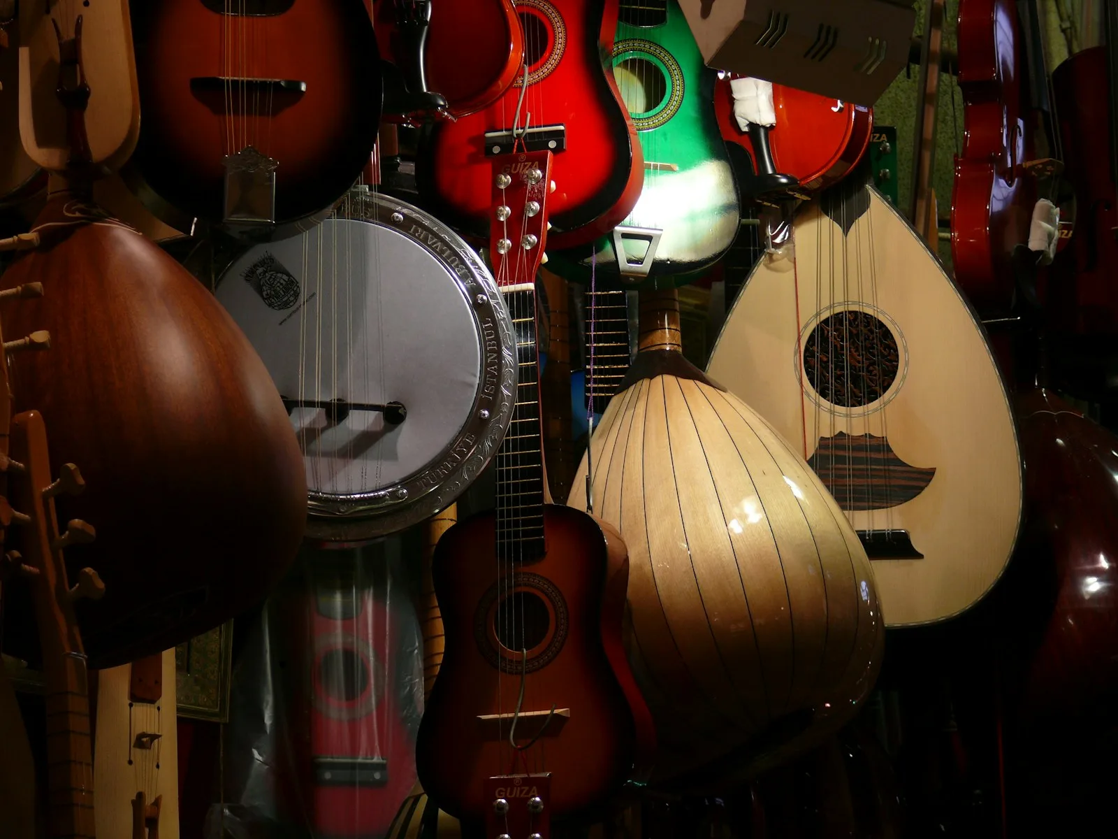assorted guitar type musical ,morocco music instruments
