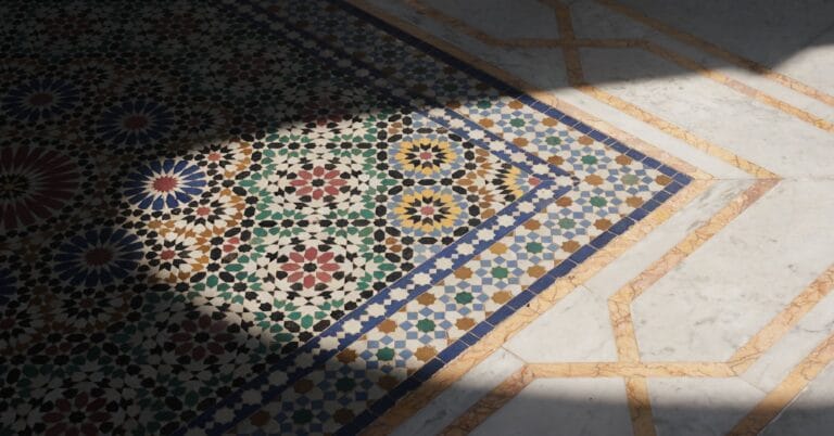 Intricate Moroccan mosaic tile flooring design with shadow contrast and vibrant colors. moroccan zellige tiles