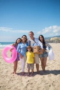 Happy family posing on a sunny Morocco beach during summer vacation.10 day Morocco family vacation itinerary