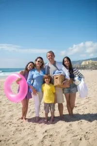 Happy family posing on a sunny Morocco beach during summer vacation.10 day Morocco family vacation itinerary