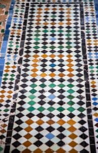 Diamond patterned mosaic tiles in various colors.Moroccan Tiles Zellige
