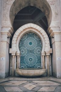 a large ornate door in a building.Moroccan Tiles Zellige