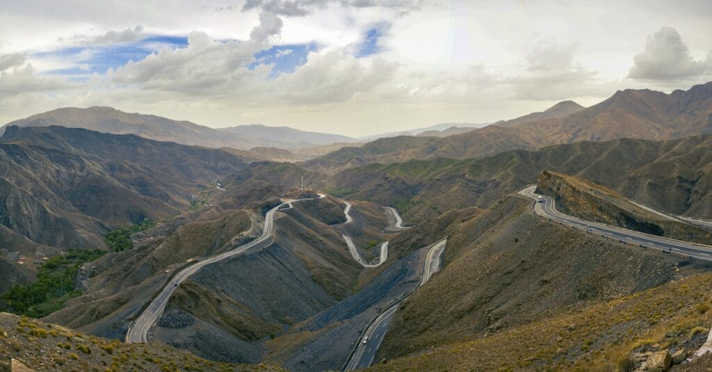 A view of a winding road in the mountains