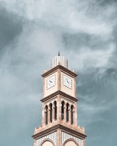 a clock tower with a cloudy sky in the background.February for Ladies