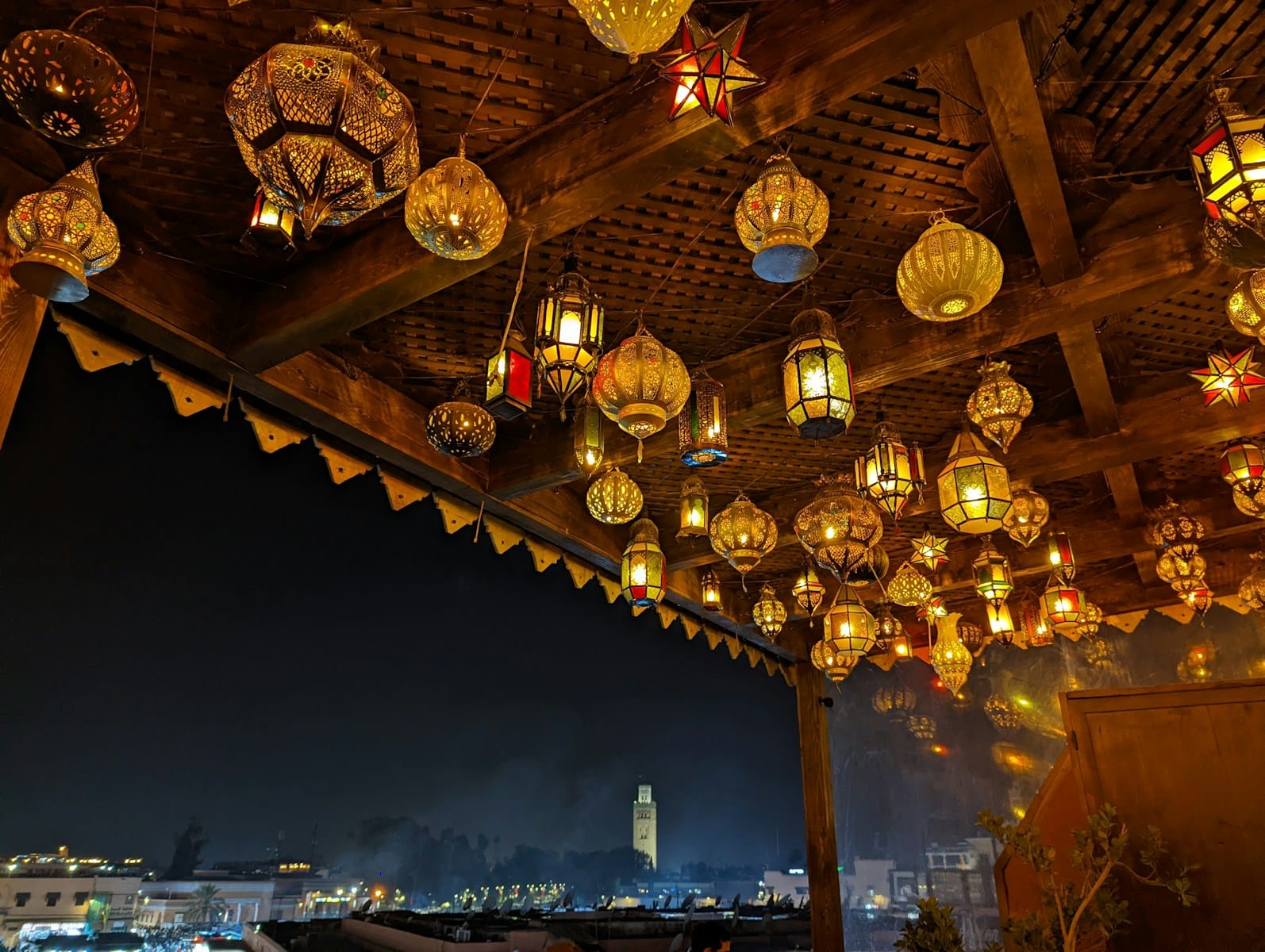 a room filled with lots of lights hanging from the ceiling.Marrakech or Casablanca
