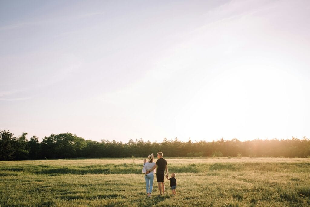 man and woman walking on green grass field during daytime.best time to visit Morocco with kids
