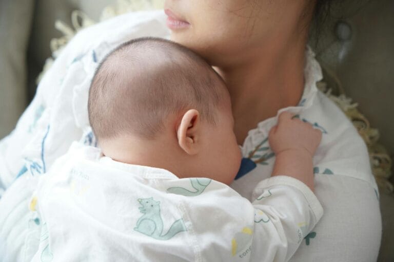 A newborn baby peacefully Breastfeed on the mother's chest, capturing a tender moment of love and comfort.Breastfeed in Public in Morocco