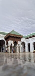 A group of people standing outside of a building.What to Do in Fes Morocco