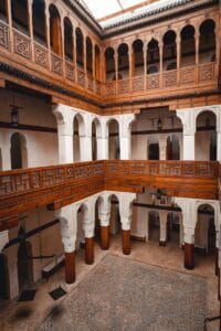 a large building with a clock on the wall.How Many Days in Fes
