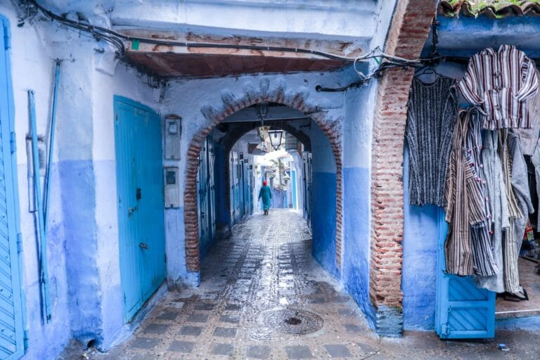 person walking on pathway.What to Do in Chefchaouen