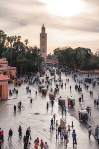 a large group of people walking around a plaza.casablanca from marrakech