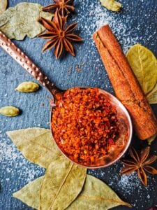 an assortment of spices and spices on a table