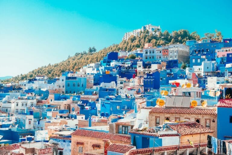 blue and white painted houses on the cliff.luxury family