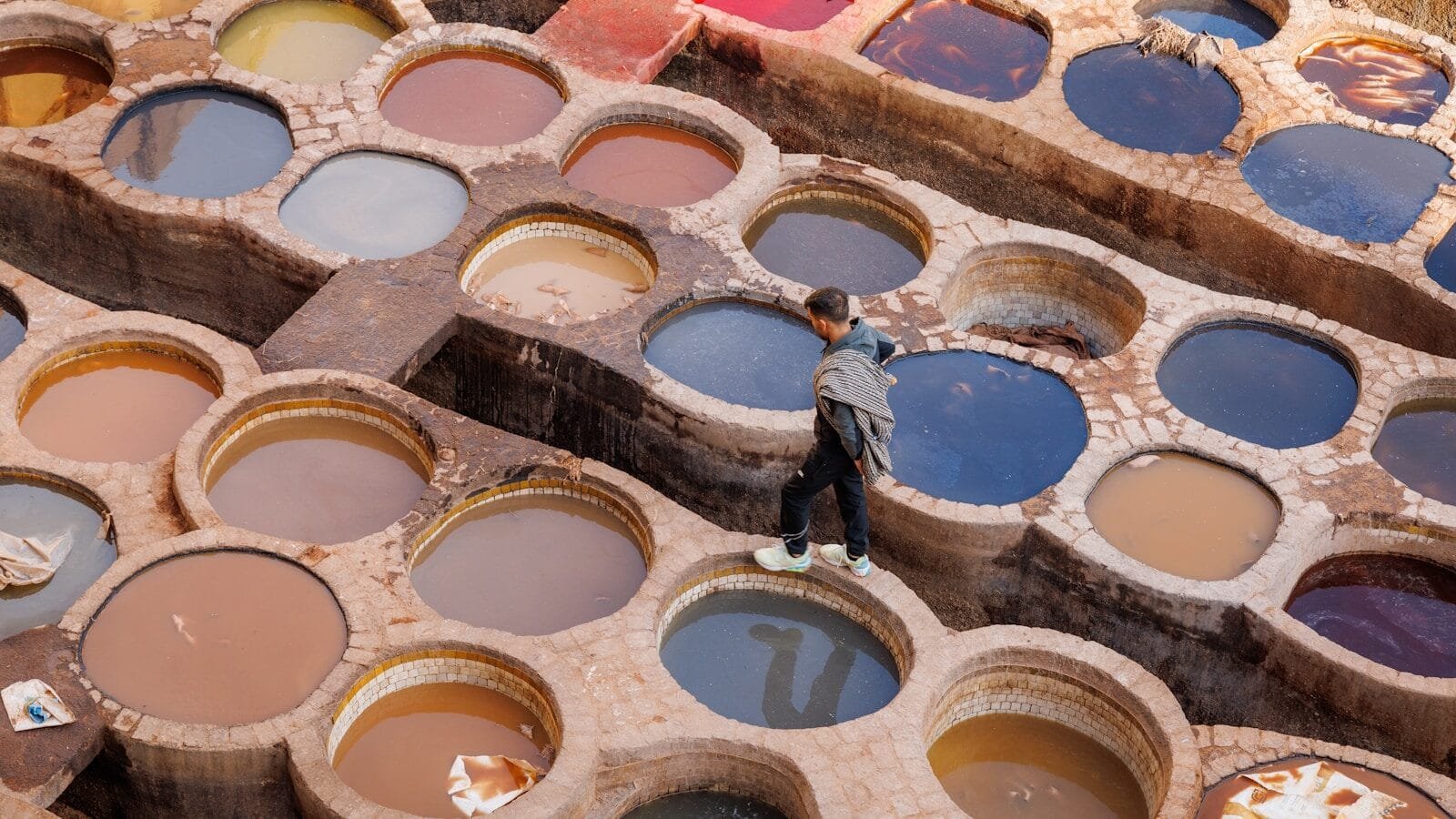 A person standing in front of a box of paint.morocco fez or marrakech