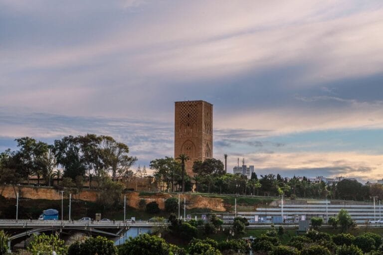 Hassan Tower in Rabat, Morocco, under dramatic evening skies. Iconic landmark.Is Rabat Safe for Families