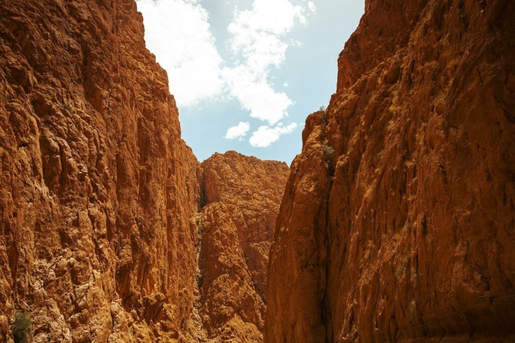a rocky canyon with a blue sky.Tinghir Morocco