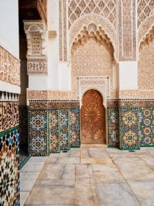 a doorway in a building with a tiled floor and walls.autistic child