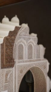 Intricate architectural details with ornate carvings and arches.Morocco With Kids