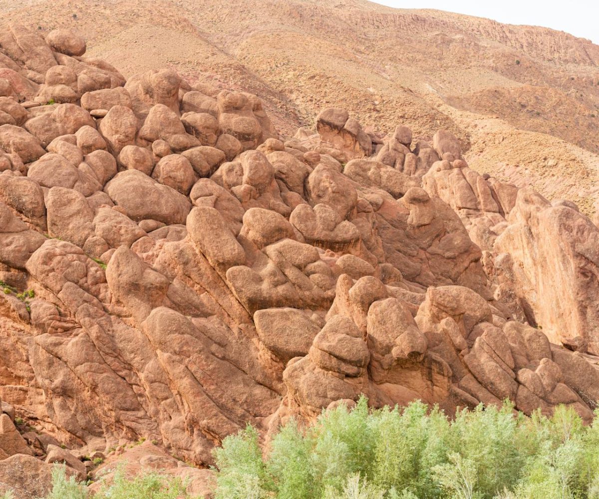 Captivating rock formations at Dades Gorge with distinct geology in a desert landscape.4 days tour from marrakech to fes