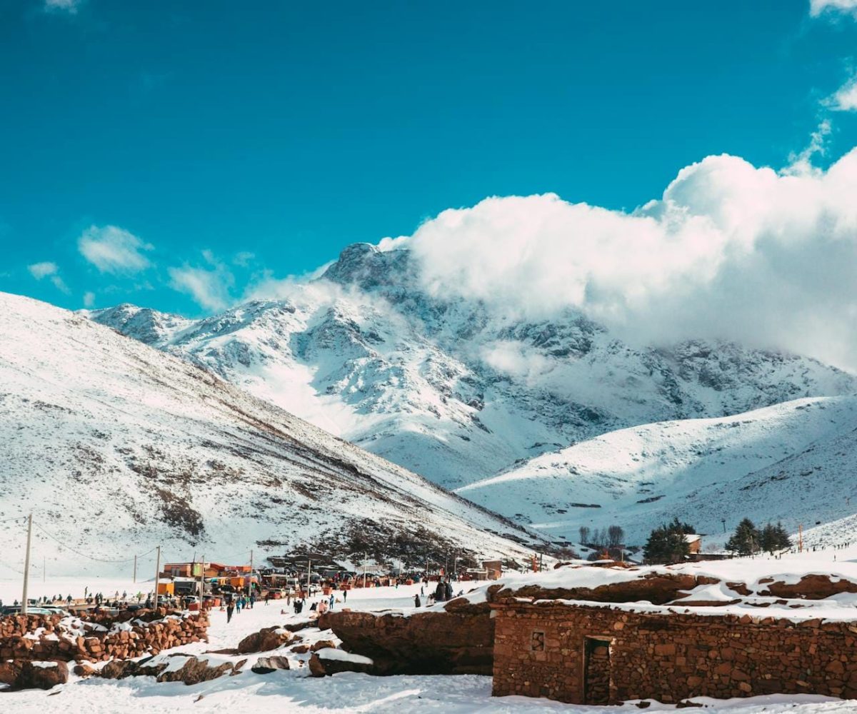 Snow-covered landscape in Oukaimeden, Morocco with scenic mountain views.4 days tour from marrakech to fes