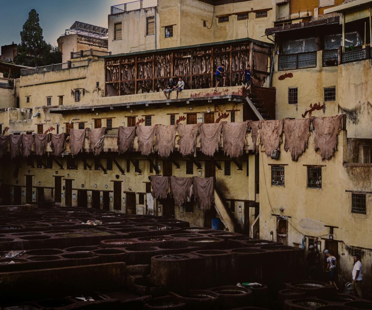 Explore the historic leather tannery in Fez, Morocco, showcasing traditional dyeing processes and architecture.10 day Morocco tour from Casablanca