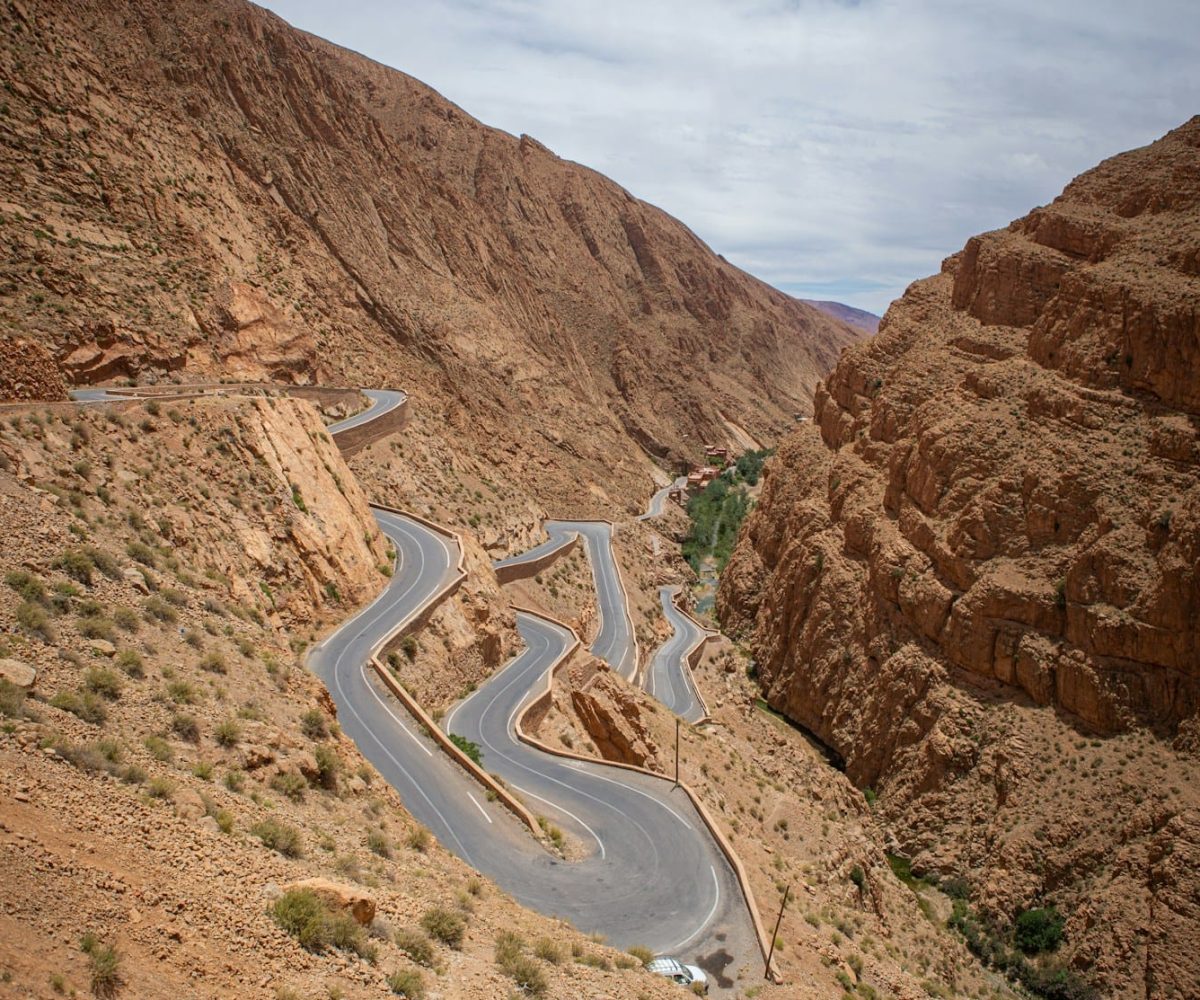 A winding road in the middle of a desert,marrakech to merzouga