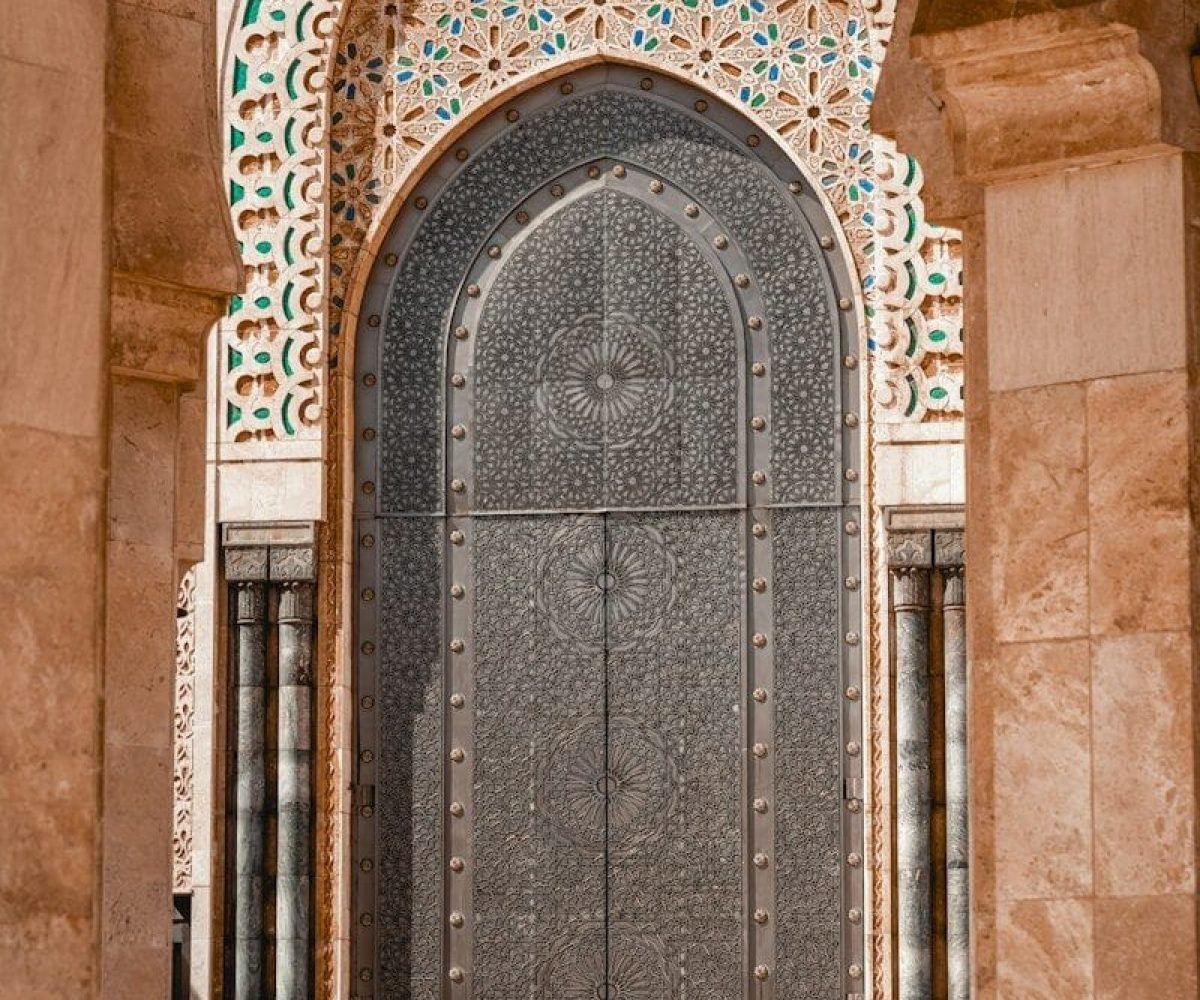 a person standing in front of a large door