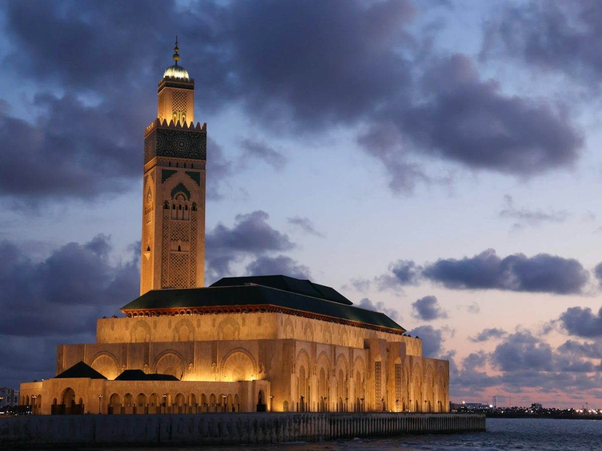 a tall tower with a clock on top of it,11 days tour from Casablanca