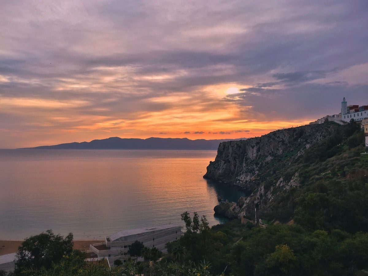 a body of water with a building on the side,7 days tour from casablanca